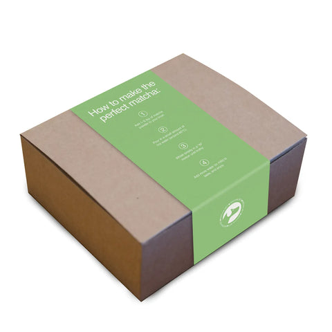 Matcha set packaging with green label on a white background (back, with details on how to make the perfect matcha) by Big Dog Coffee